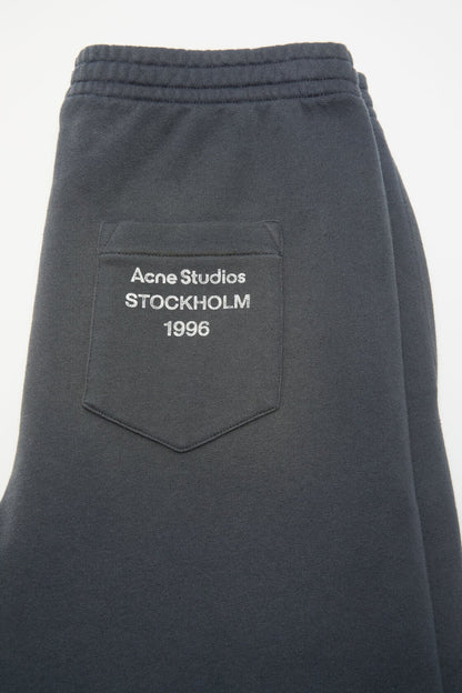 Fleece trousers with stamp logo - Faded black